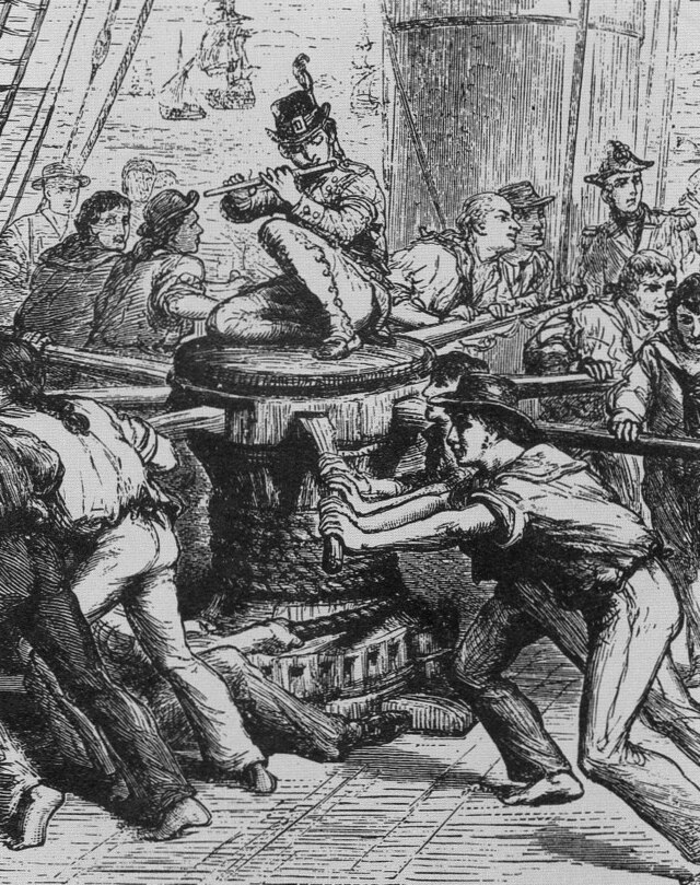 Sailors walking the capstan bars to raise the anchor — Rio Grande was a capstan shanty sung during the long march around the drum